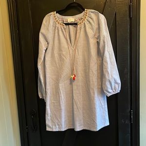 Navy/white pin stripe with flower tassel detail.